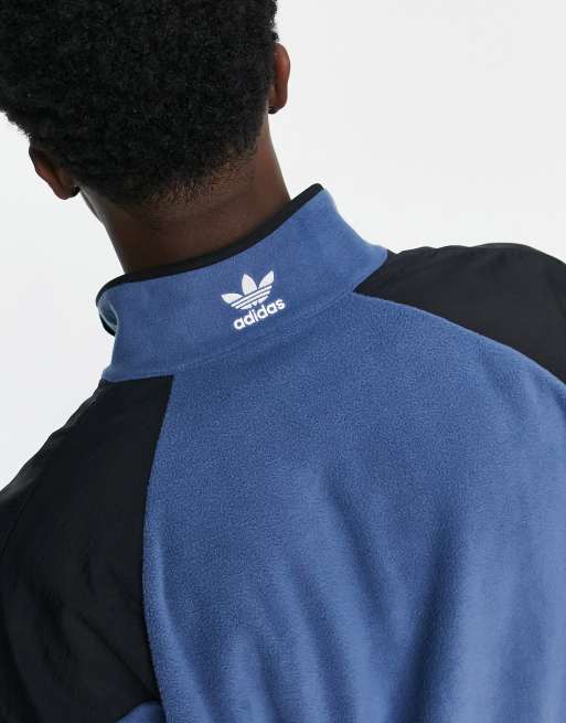 adidas Originals Rekive polar fleece in blue with graphic detail