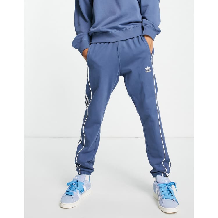 Adidas originals vintage joggers with outlet taped side stripe in blue ce4824