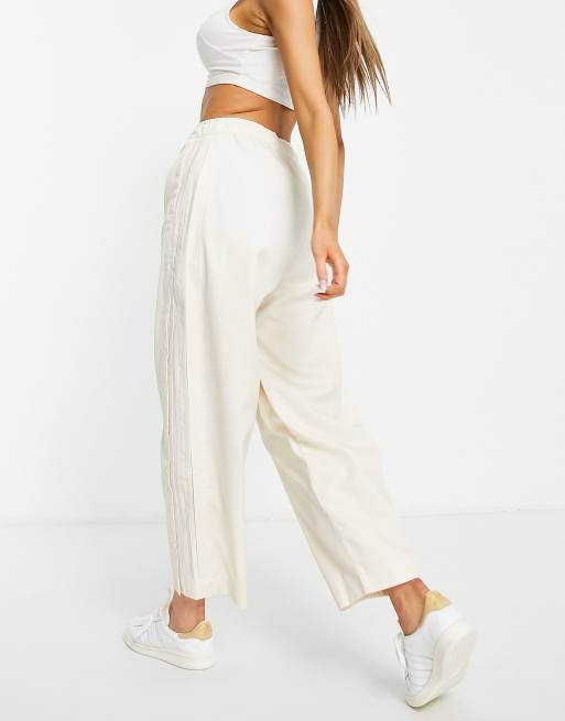 adidas Originals relaxed pants with snap detail in off white ASOS