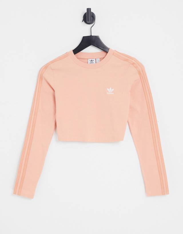 adidas Originals Relaxed Risque long sleeve crop top in blush