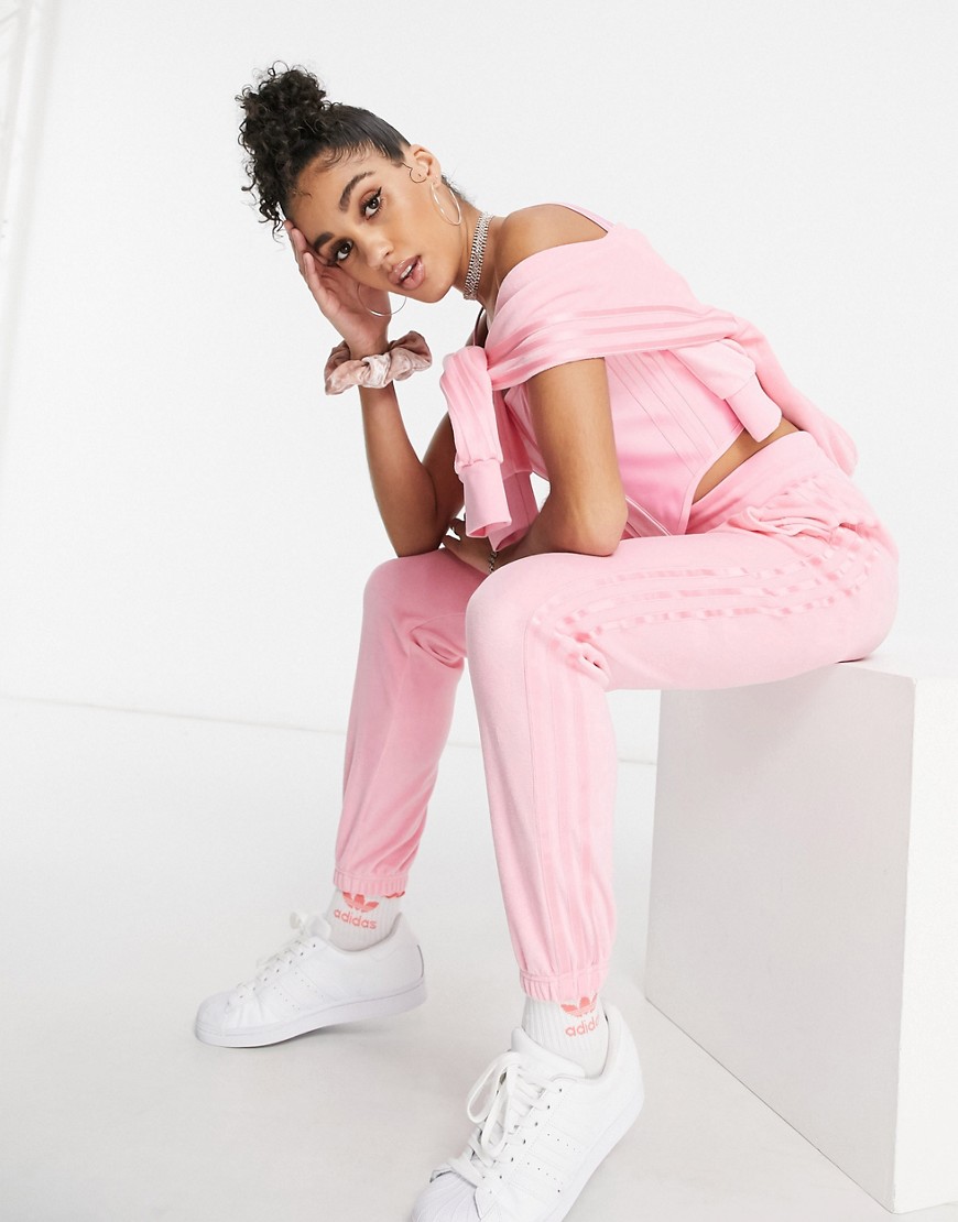 Adidas Originals 'Relaxed Risqué' velour joggers in vibrant pink