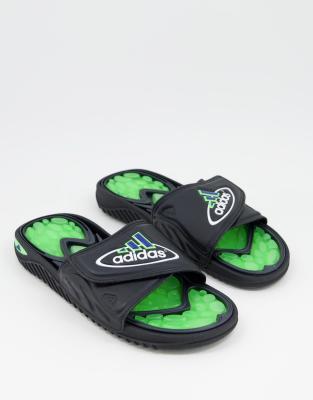 adidas Originals Reptossage sliders in black and solar green - ASOS Price Checker