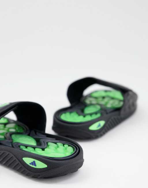 Green and black store adidas slides