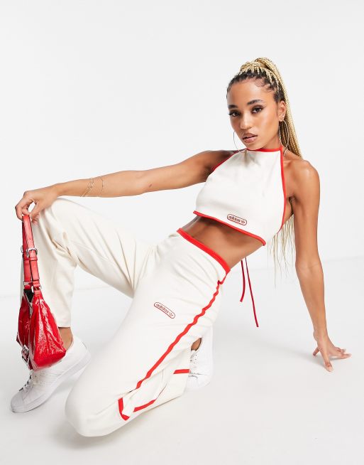 adidas Originals - Resort - Pantalon large avec liserés rouges - Blanc cassé