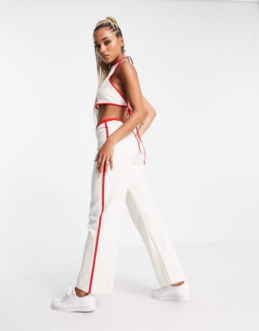 Adidas red and store white pants