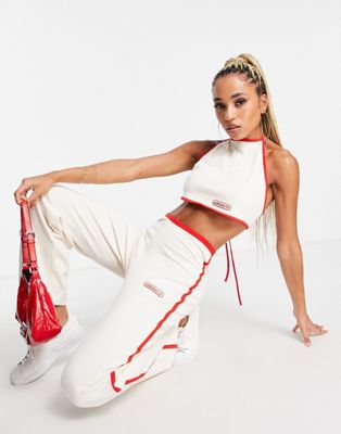 adidas Originals resort wide leg trousers in off white with red binding detail