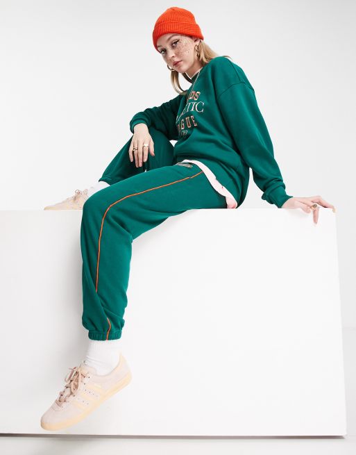 adidas Originals – Retro Luxury – Collegegröna mjukisbyxor