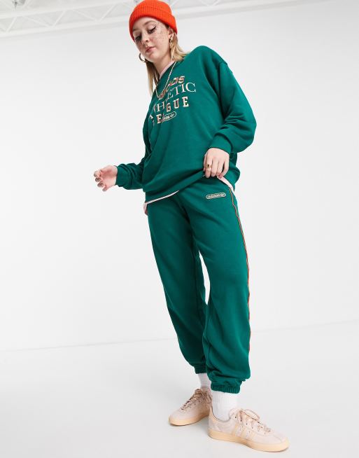 Adidas originals store green joggers