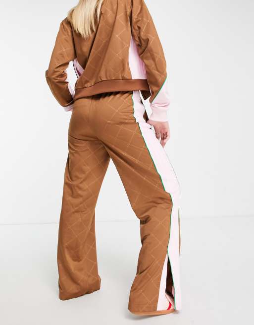 adidas Originals Retro Luxury track pants in brown with monogram