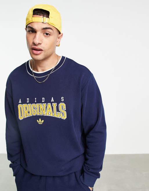 adidas Originals Retro Revival logo graphics sweatshirt in navy