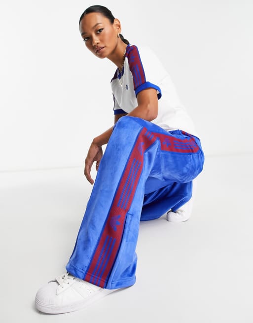 Adidas taped best sale track pants