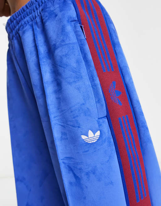 adidas Originals Retro Sport tape track pant in blue | ASOS