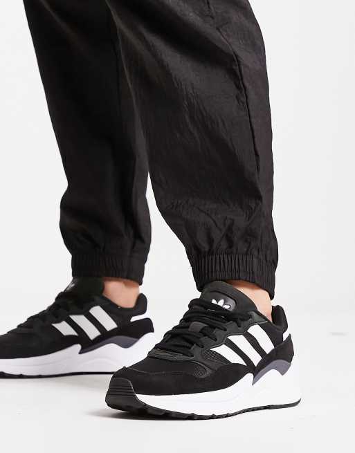 adidas Originals Retropy Adisuper trainers in black with white detail ...