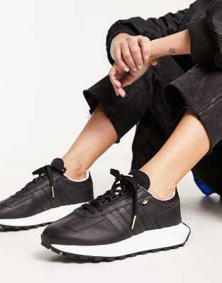 Shop Adidas Originals Retropy E5 Sneakers In Black