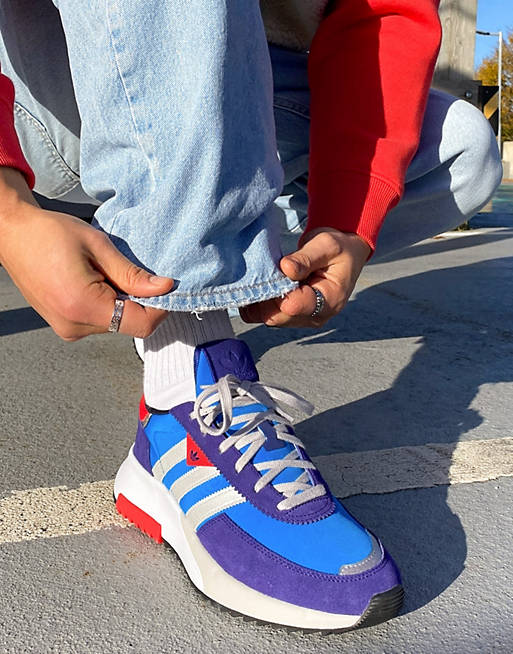 adidas Originals Retropy F2 trainers in blue and red