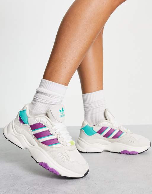 adidas Originals – Retropy F90 – Sneaker in gebrochenem Weiß mit Details in Lila