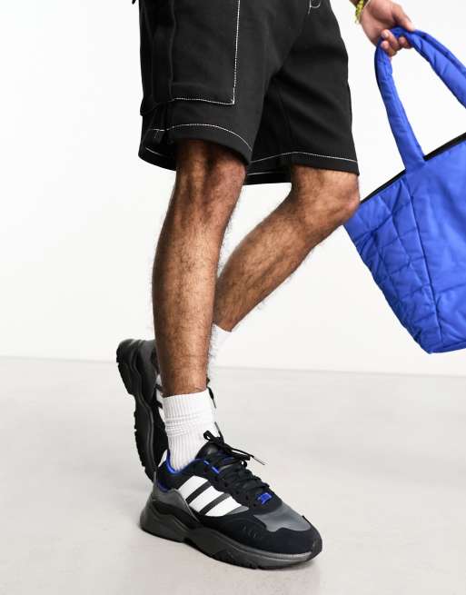 adidas Originals – Retropy F90 – Sneaker in Schwarz mit blauen Akzenten