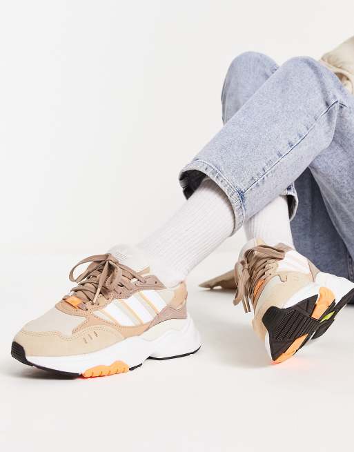 adidas Originals Retropy F90 sneakers in beige with orange details