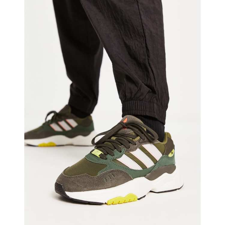 adidas Originals Retropy F90 trainers in khaki with yellow details