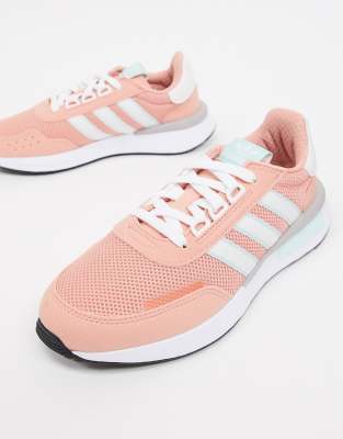 pink and white adidas trainers