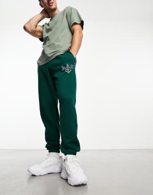 adidas Originals Rifta AAC joggers in collegiate green