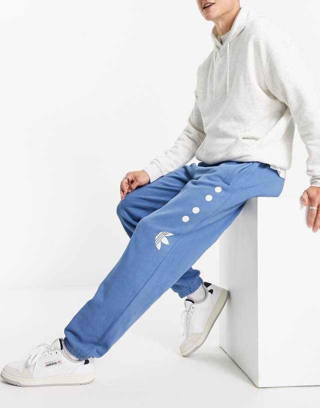 adidas Originals Rifta logo sweatpants in blue