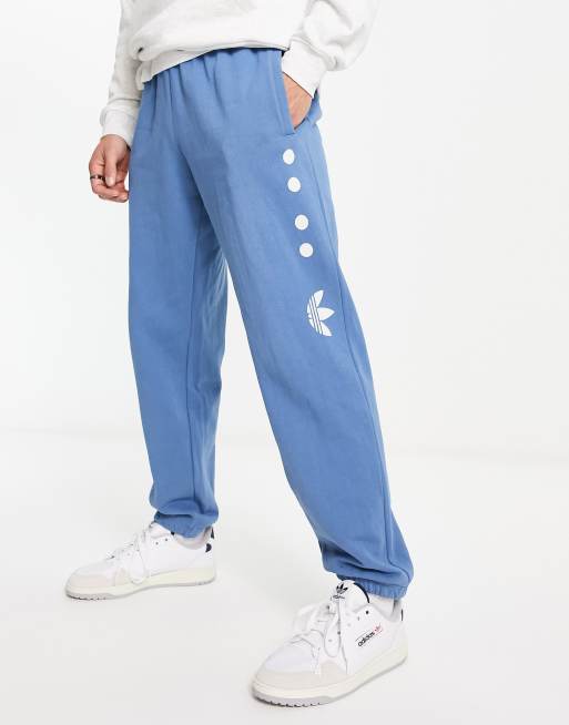 adidas Originals Rifta logo sweatpants in blue | ASOS