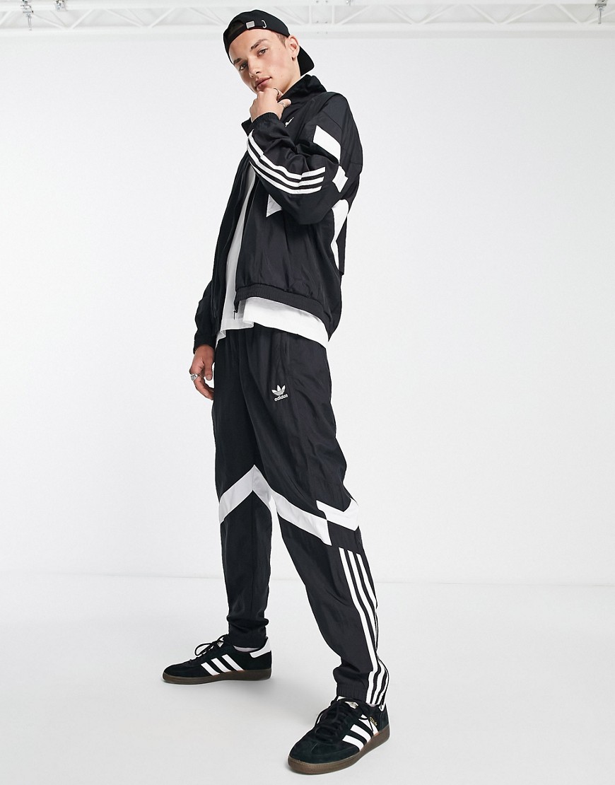 adidas Originals Rikeve cut 3-Stripes track pants in black