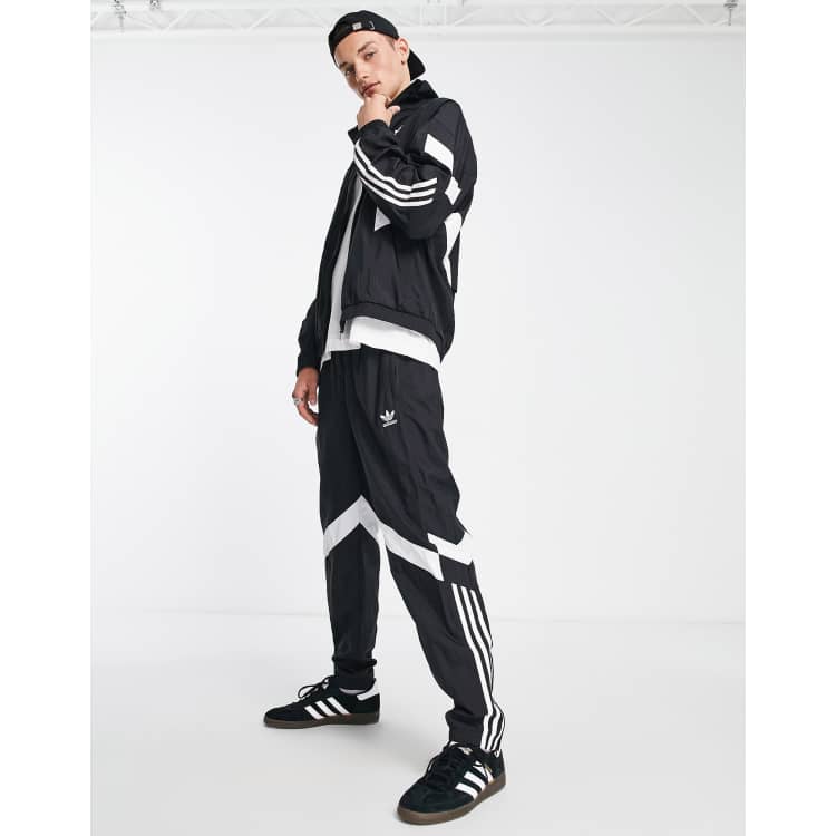 adidas woven track pants with 3-Stripes in black