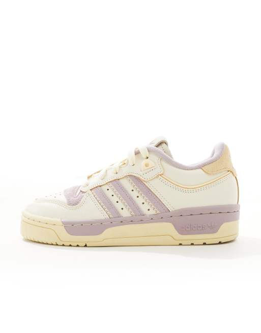 adidas Originals Rivalry 86 Low sneakers in cream and lilac ASOS