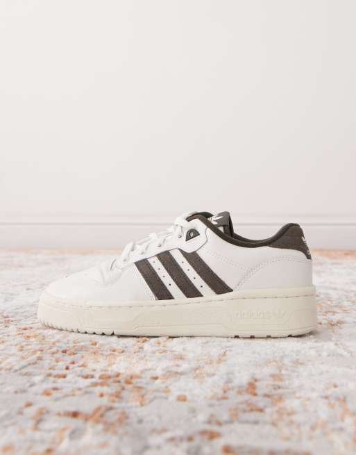 adidas Originals Rivalry 86 Low sneakers in white and olive ASOS