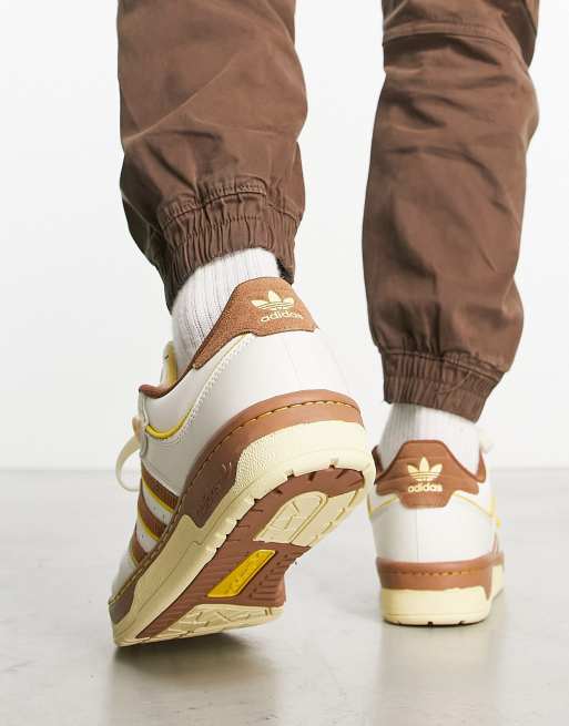 adidas Originals Rivalry Low 86 sneakers in white and brown | ASOS