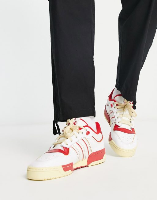 adidas Originals Rivalry Low 86 sneakers in white and red | ASOS