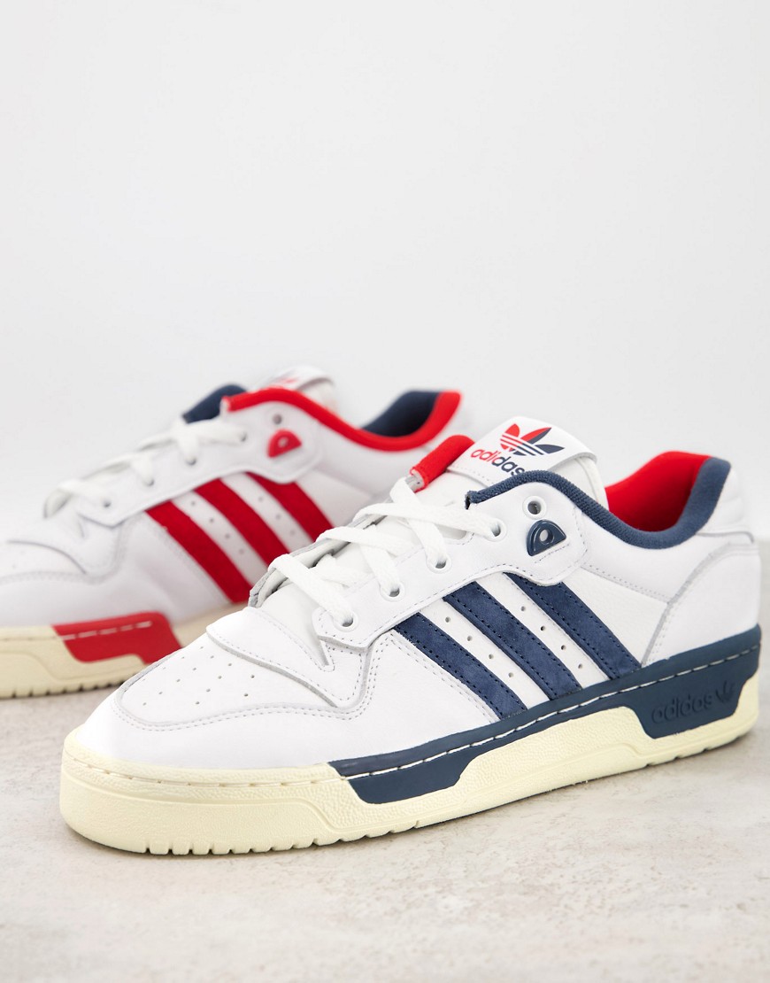 Adidas Originals Rivalry Low Premium trainers in white with miss-match stripes
