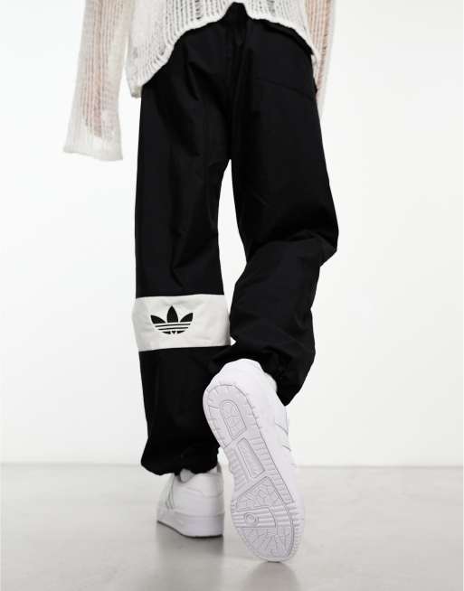 adidas Originals Rivalry Low sneakers in triple white | ASOS