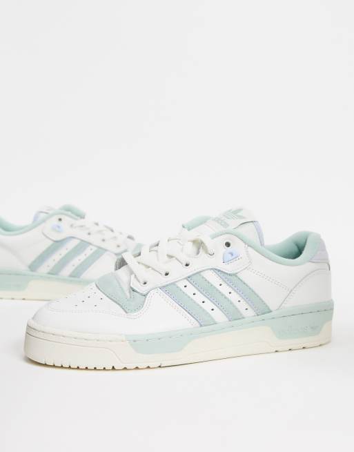 adidas Originals Rivalry Low sneakers in white and green | ASOS