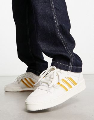adidas Originals Rivalry Low sneakers in white/gold - ASOS Price Checker