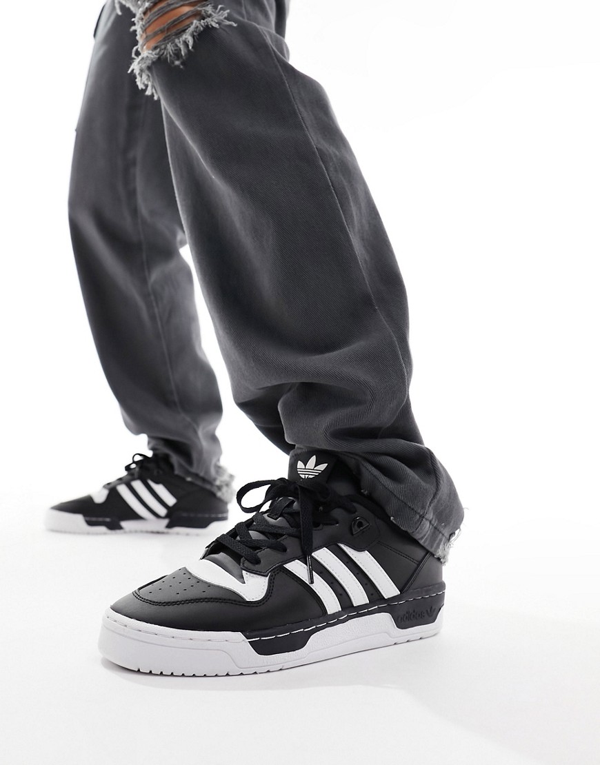 adidas Originals Rivalry Low trainers in black and white