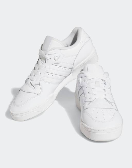 Adidas originals rivalry low trainers in store triple white