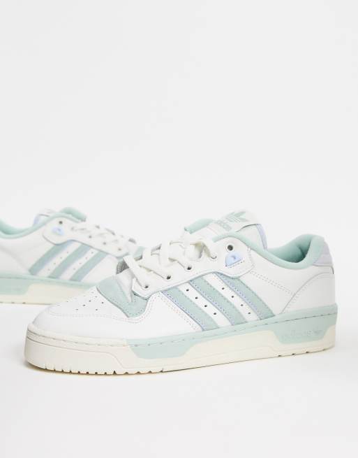 adidas Originals Rivalry Low trainers in white and green