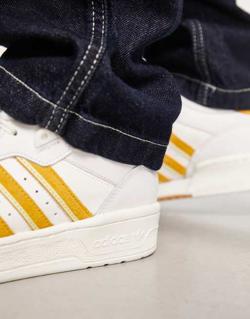 adidas Originals Rivalry Low trainers in white gold ASOS