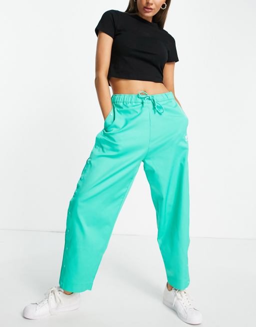 adidas Originals - Ruimvallende broek met drukknopen in groen