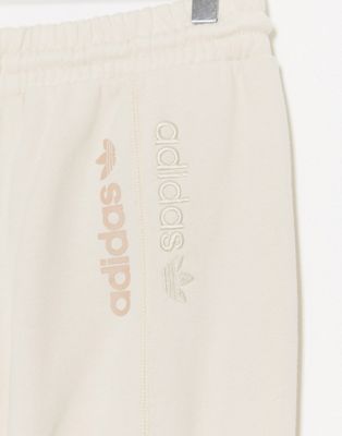 adidas originals ryv cuffed joggers in off white