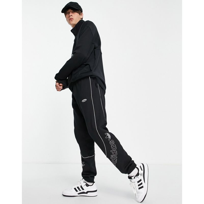 Pantaloni e leggings Activewear adidas Originals - RYV - Joggers neri con logo sulle gambe