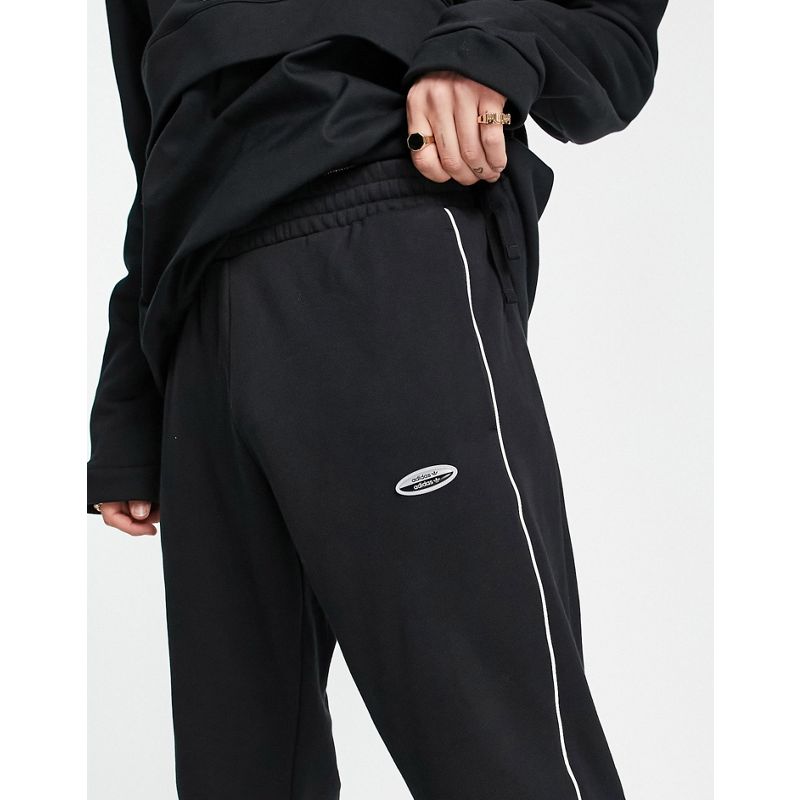 Pantaloni e leggings Activewear adidas Originals - RYV - Joggers neri con logo sulle gambe