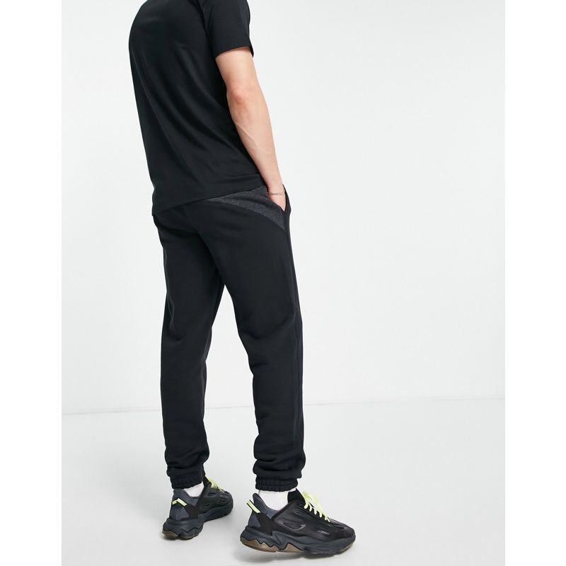 Pantaloni e leggings Uomo adidas Originals - RYV - Joggers neri con pannelli in tessuto a contrasto