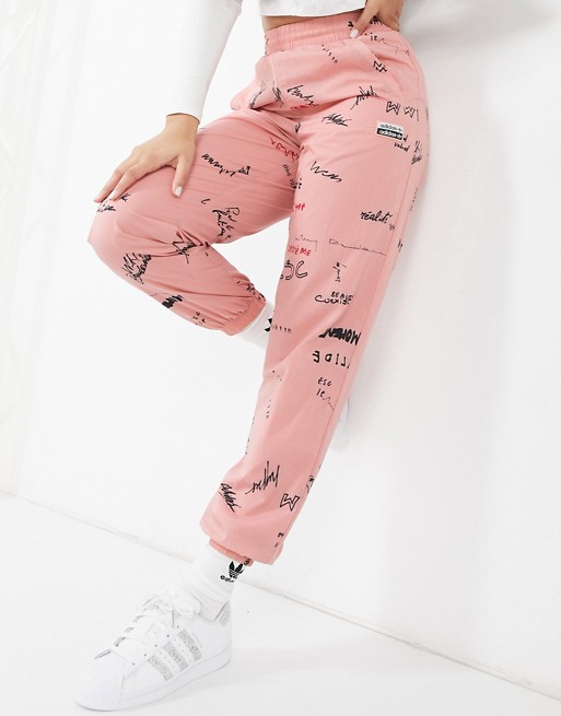 adidas Originals RYV printed cuffed joggers in pink