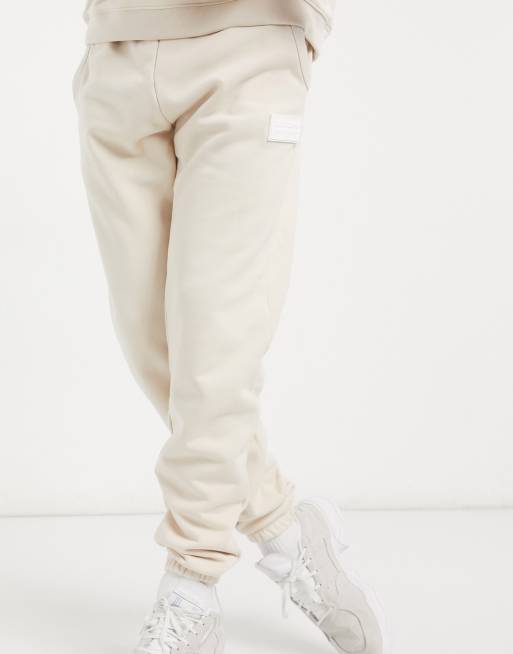 Adidas cream joggers sale