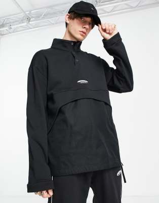 adidas Originals RYV over head sweatshirt in black with fabric contrast panel - ASOS Price Checker