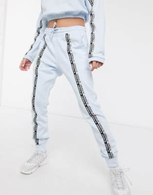 adidas originals ryv taping track pants in blush